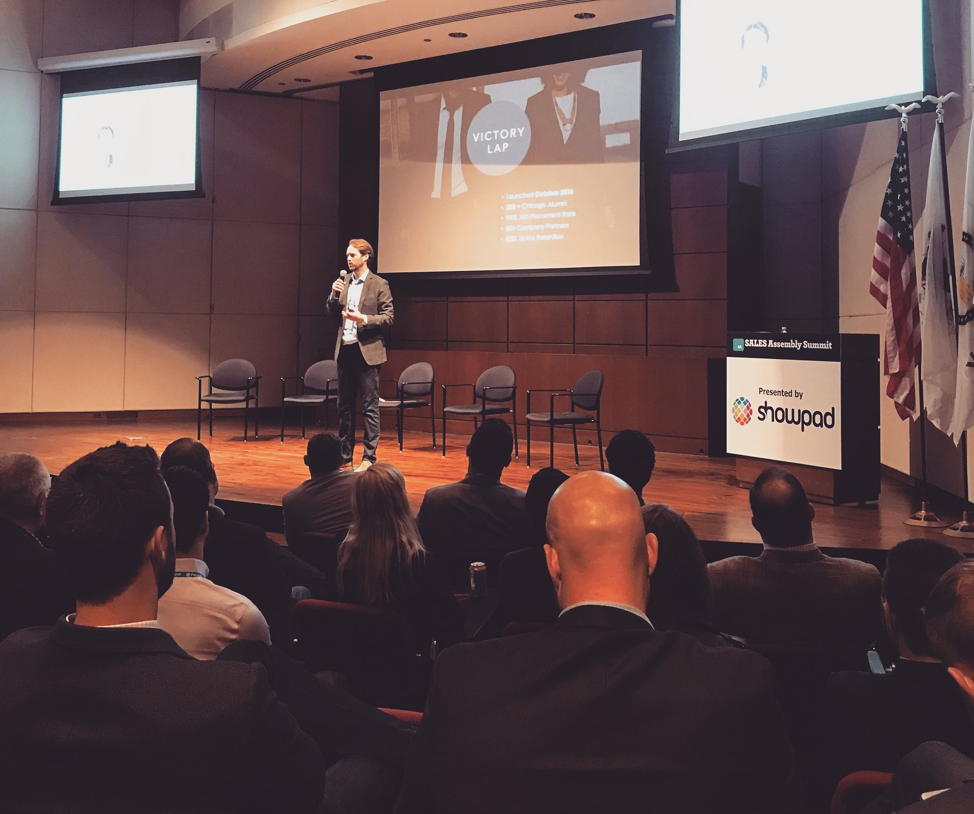CEO Brian Bar speaking at a sales summit CEO Brian Bar speaking at a sales summit